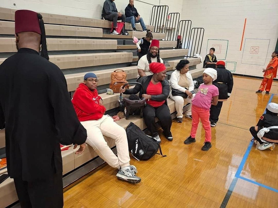 Parents and Students at a Martial Arts Tournament